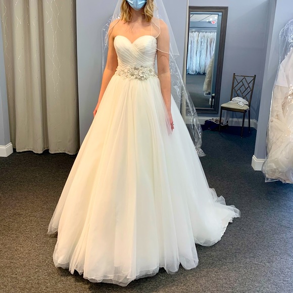Never used ball gown wedding dress